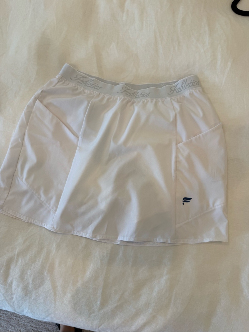 Fabletics White Athletic Skort with Branded Waistband and Subtle Logo
